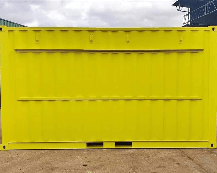 Interior of a fitted-out container showing wall rails above a coated floor
