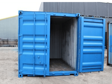 A small storage container with its doors open showing a raised bunded floor