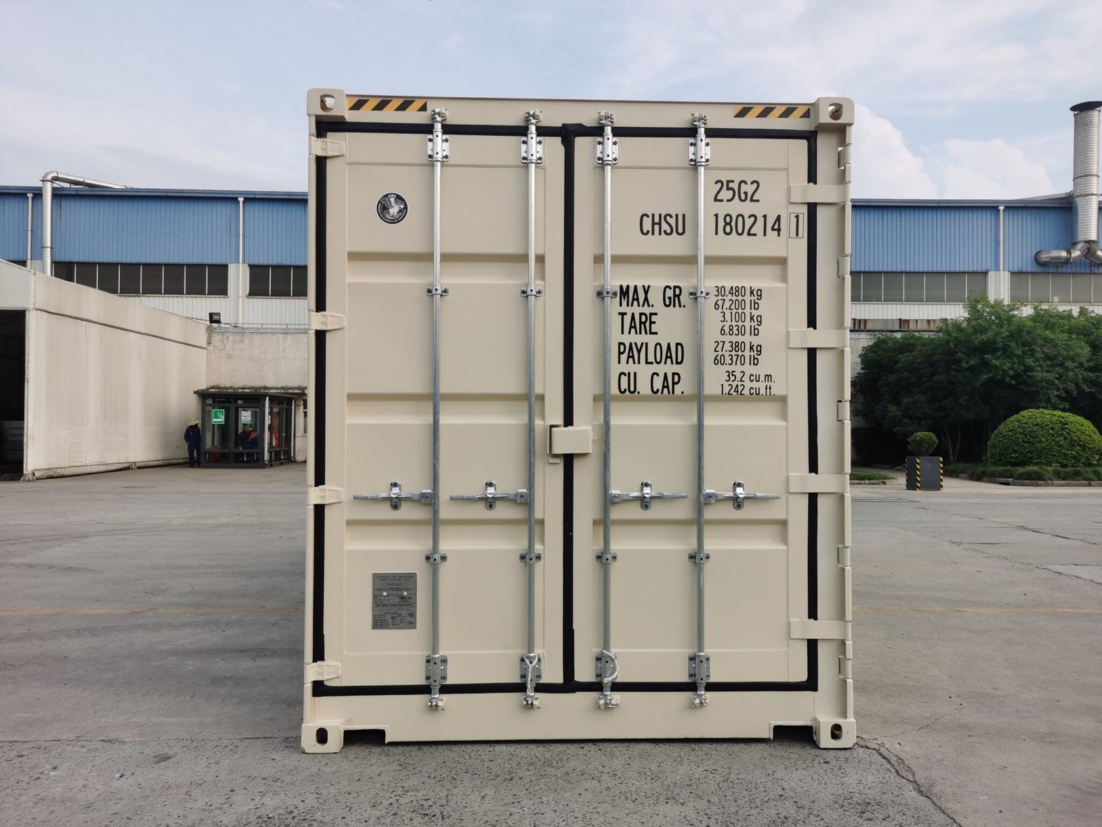 New 20ft high cube open side shipping container in beige, photographed from the door end with the cargo doors closed