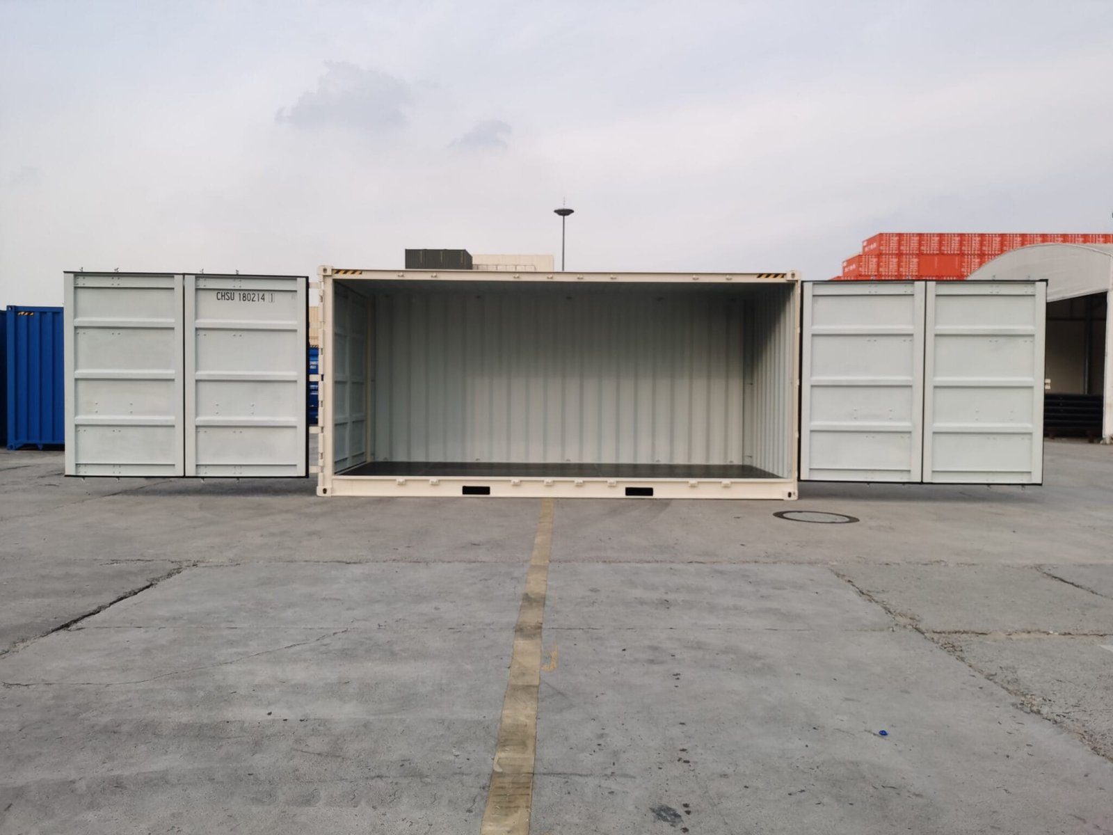 New 20ft high cube open side shipping container in beige with the full side door opened