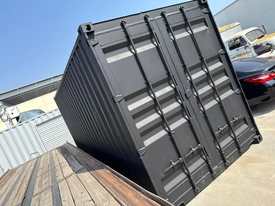 20ft Shipping Container – Matte Black w/ 12’ Side Roll-Up Door