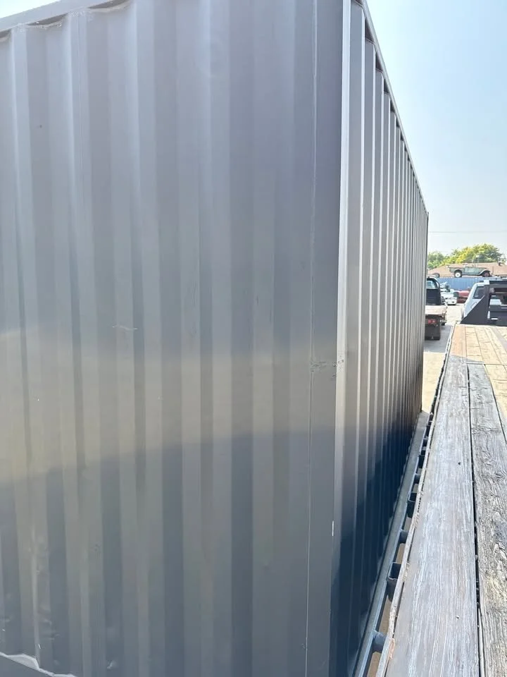 20ft Shipping Container – Matte Black w/ 12’ Side Roll-Up Door