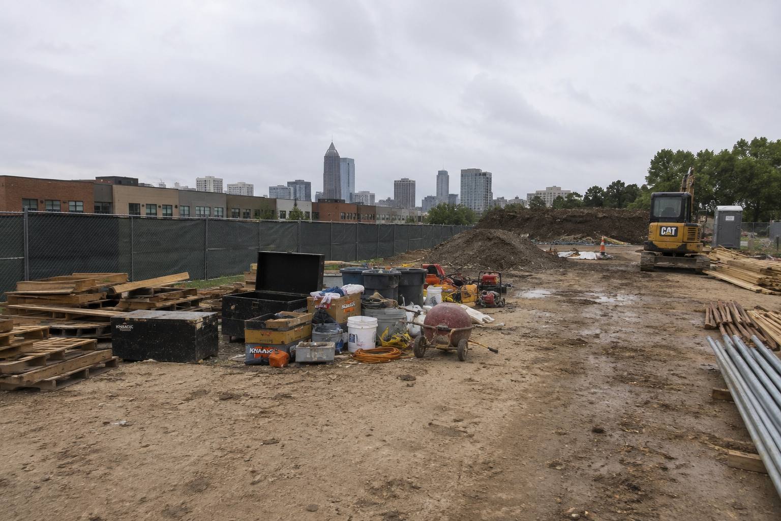 Colorado Springs construction site before delivery with tools, pallets and buckets left in the open with no secure storage
